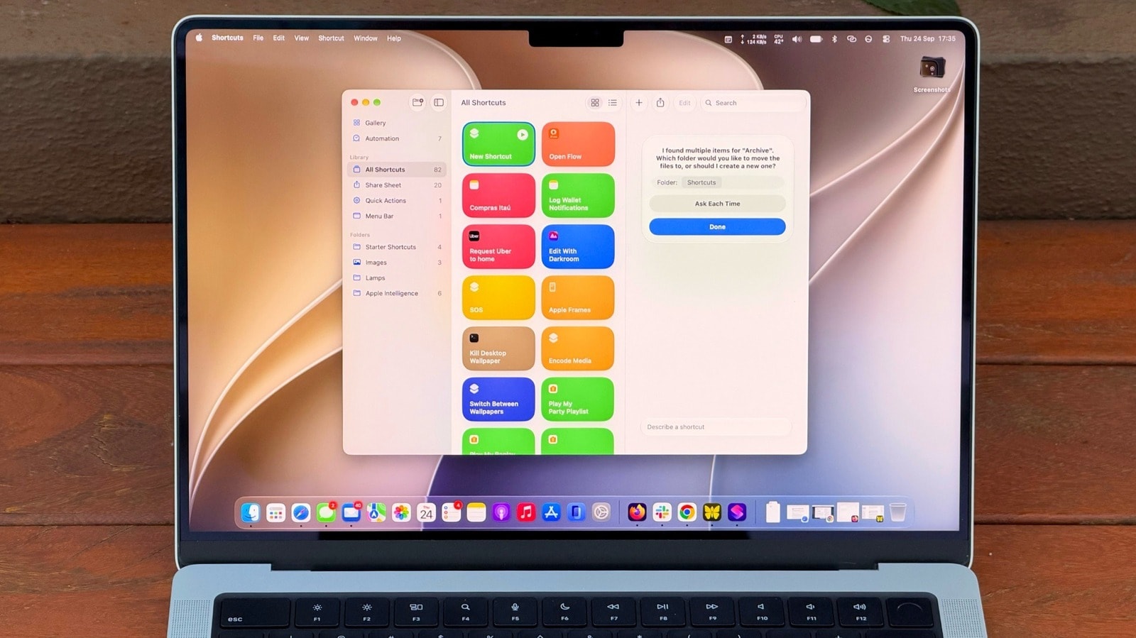 Apple MacBook displaying the Shortcuts app interface on the screen.