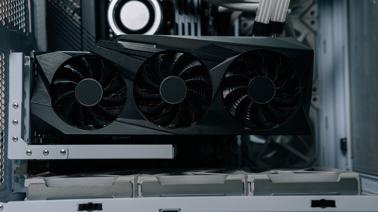 A collection of older computer graphics cards on a desk