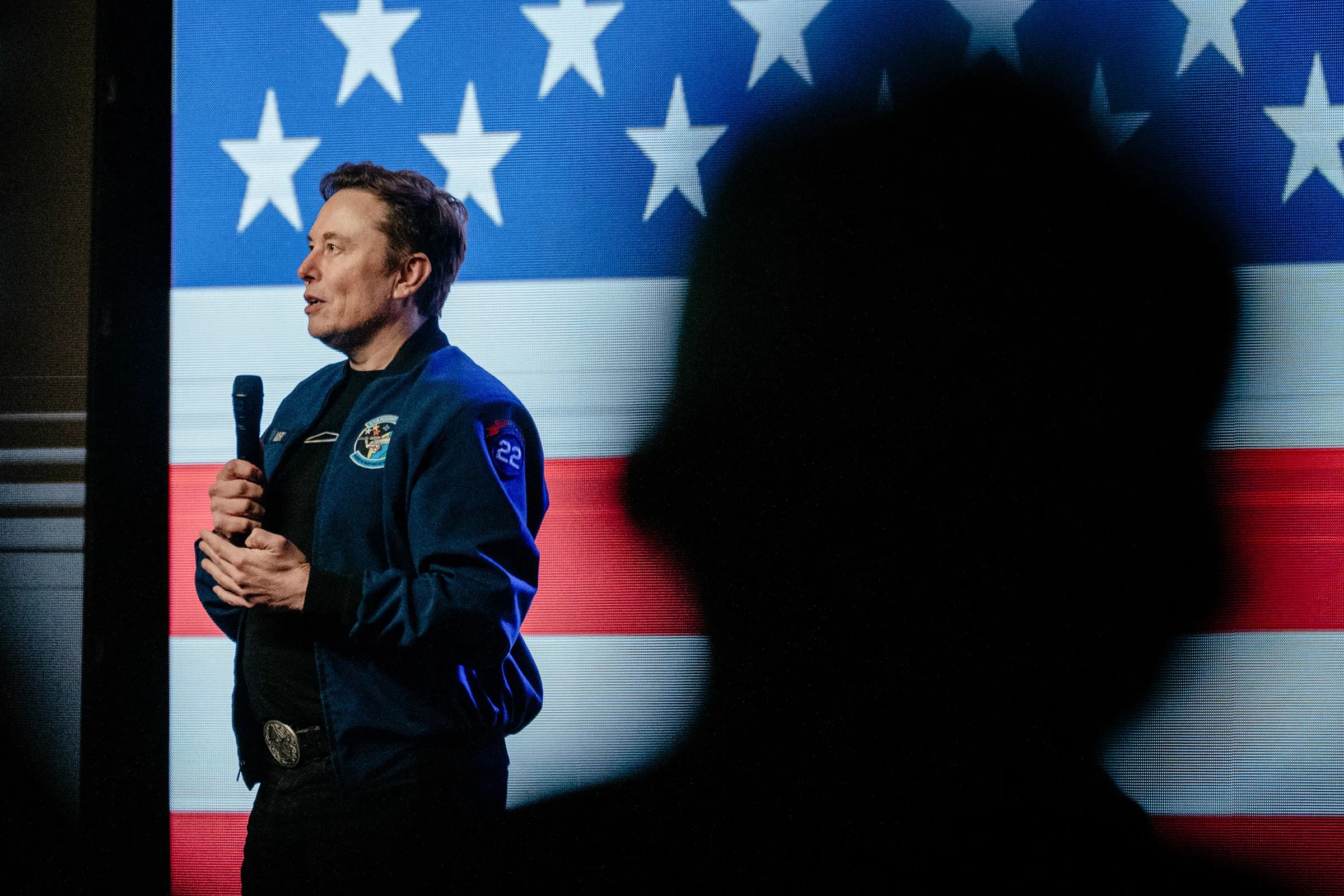Elon Musk speaking at a public event