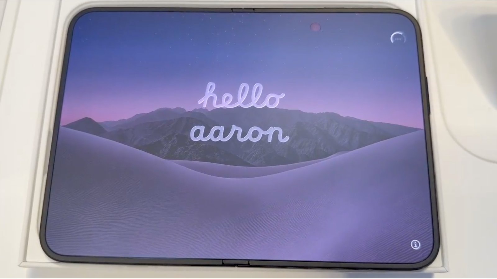 An iPhone Duo screen displaying a personalized hello message.