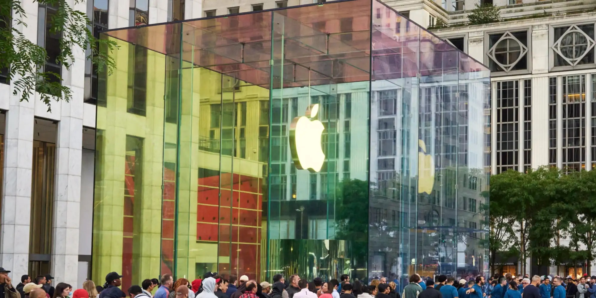 The iconic Apple Fifth Avenue glass cube store in New York covered in protective fabric.