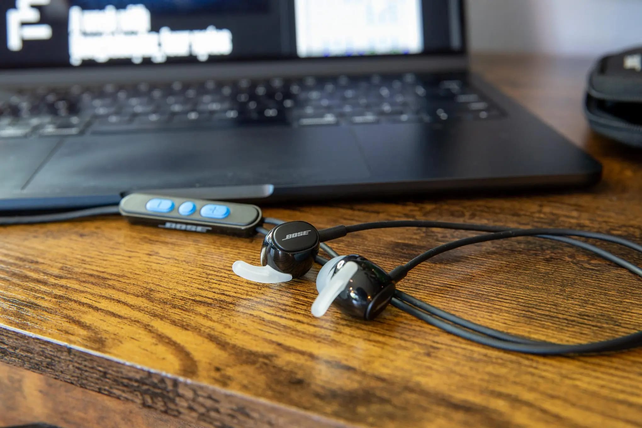 Bose Noise Cancelling Wired Earbuds on desk