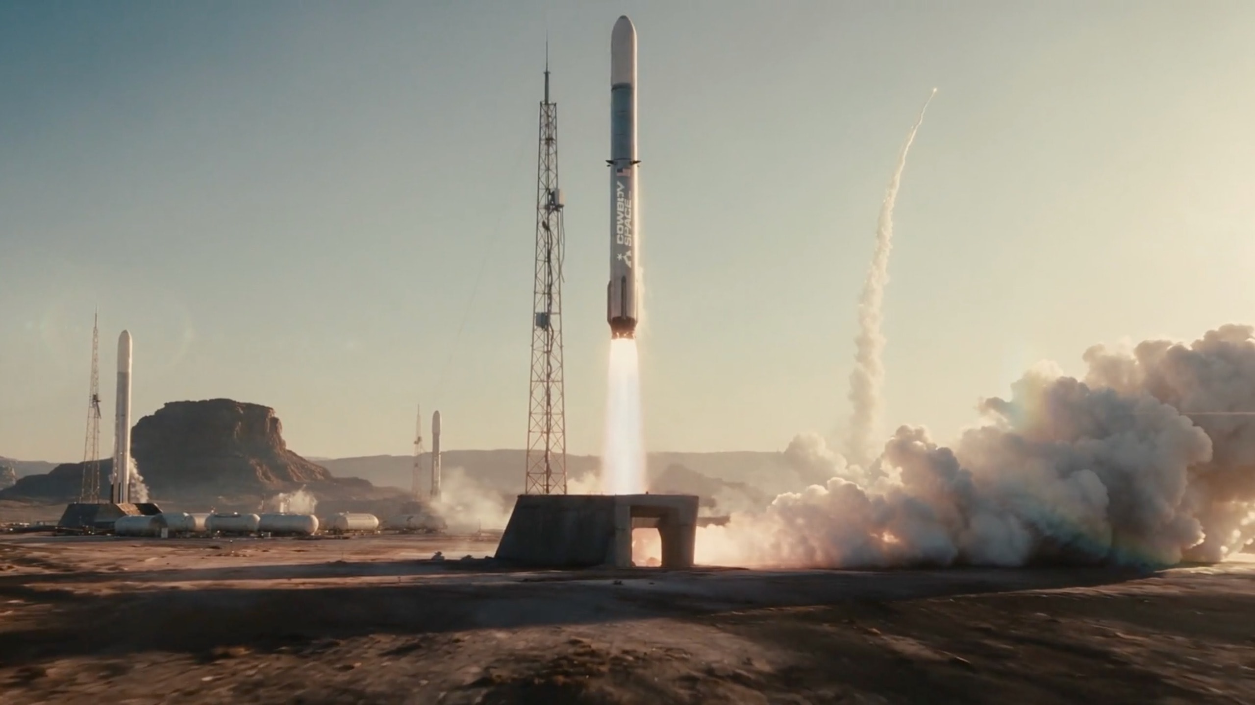A conceptual rendering of the Big Iron rocket in orbit with solar panels deployed.