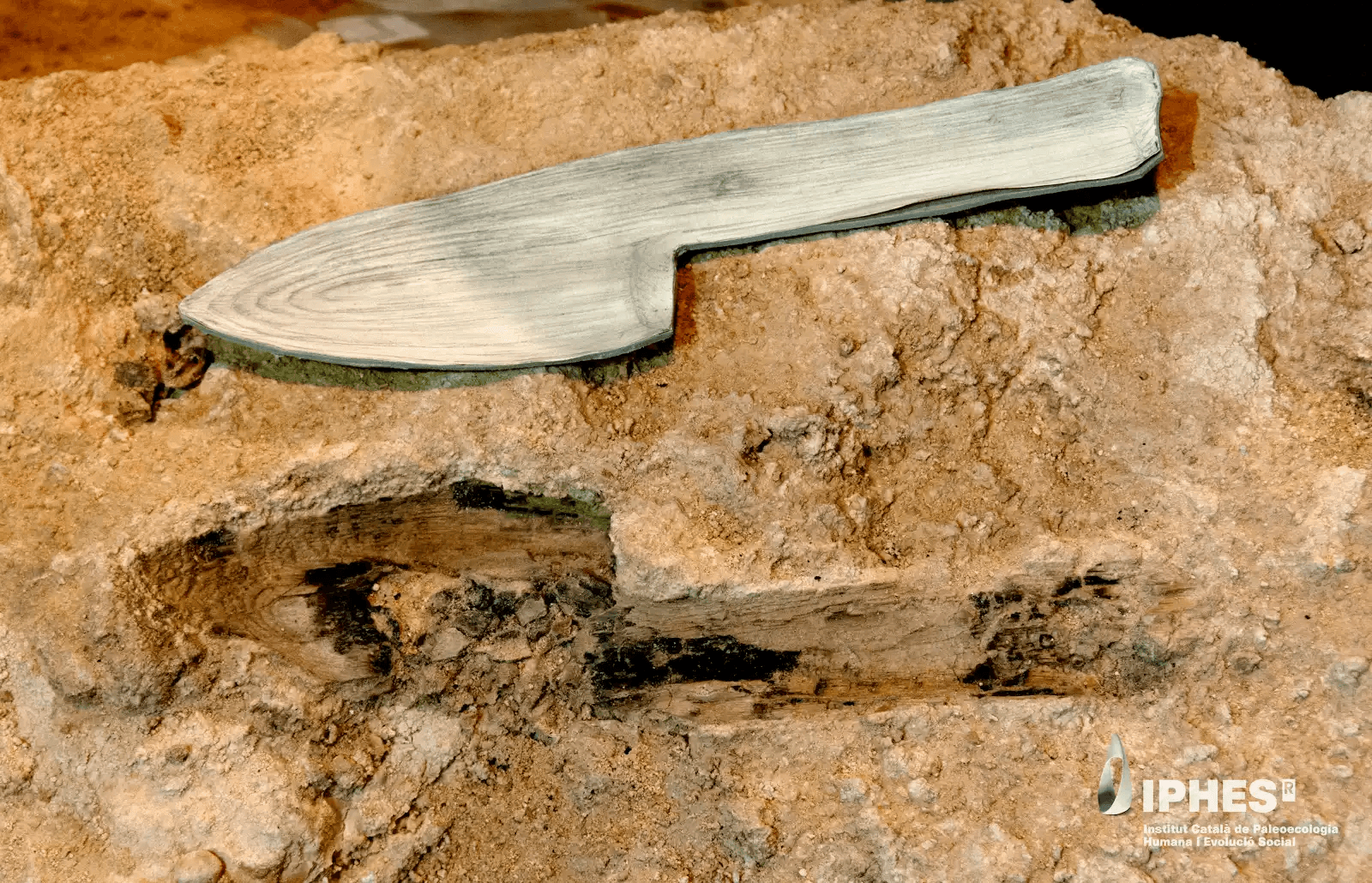 Stone cast impression of an ancient Neanderthal wooden tool
