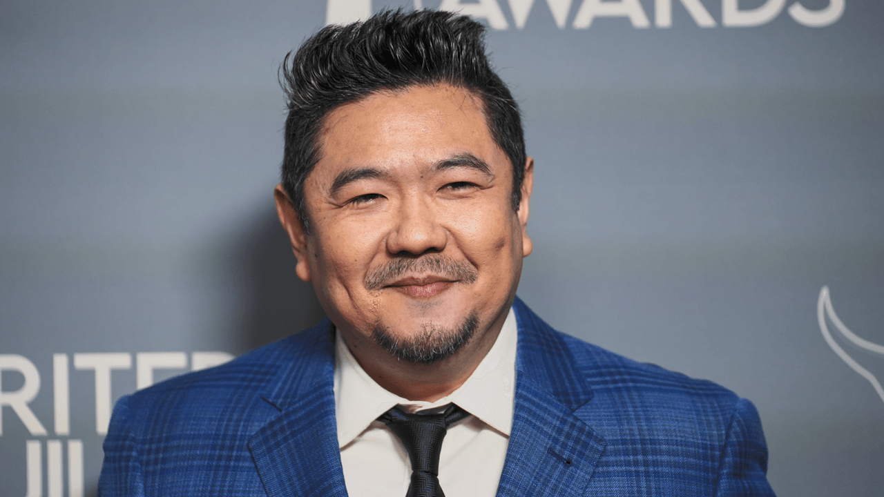 Eric Bauza posing at an industry event