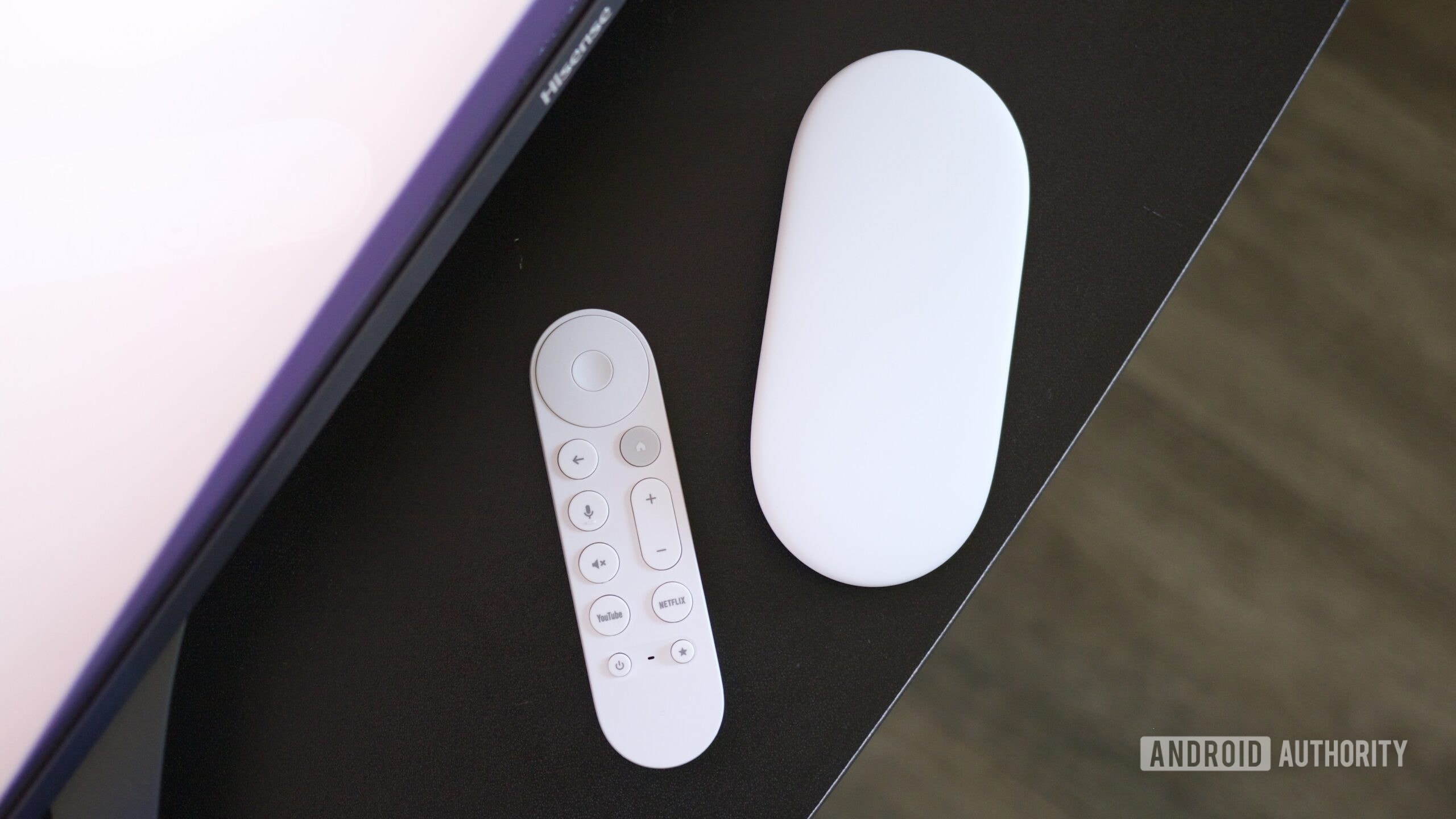 Google TV Streamer device on a surface