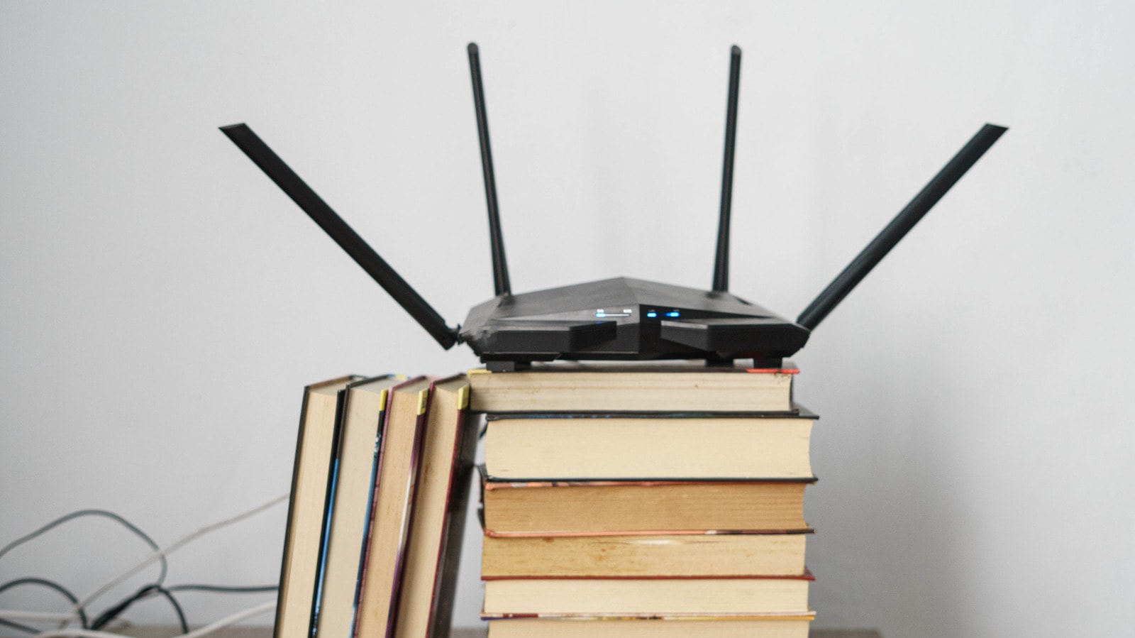 A Wi-Fi router displaying network status indicators alongside IPv6 configuration concepts
