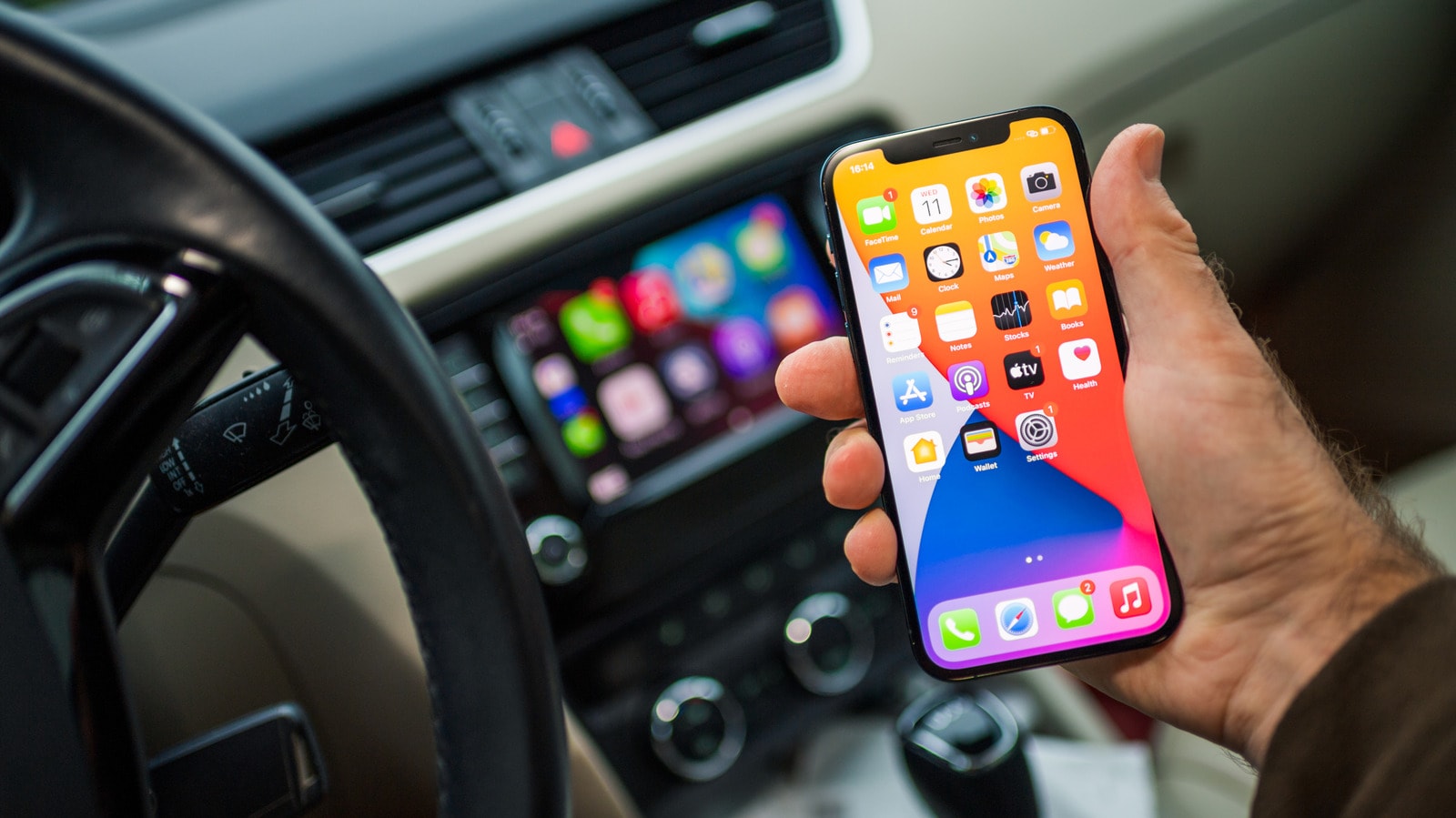 Apple CarPlay interface displayed on a car dashboard