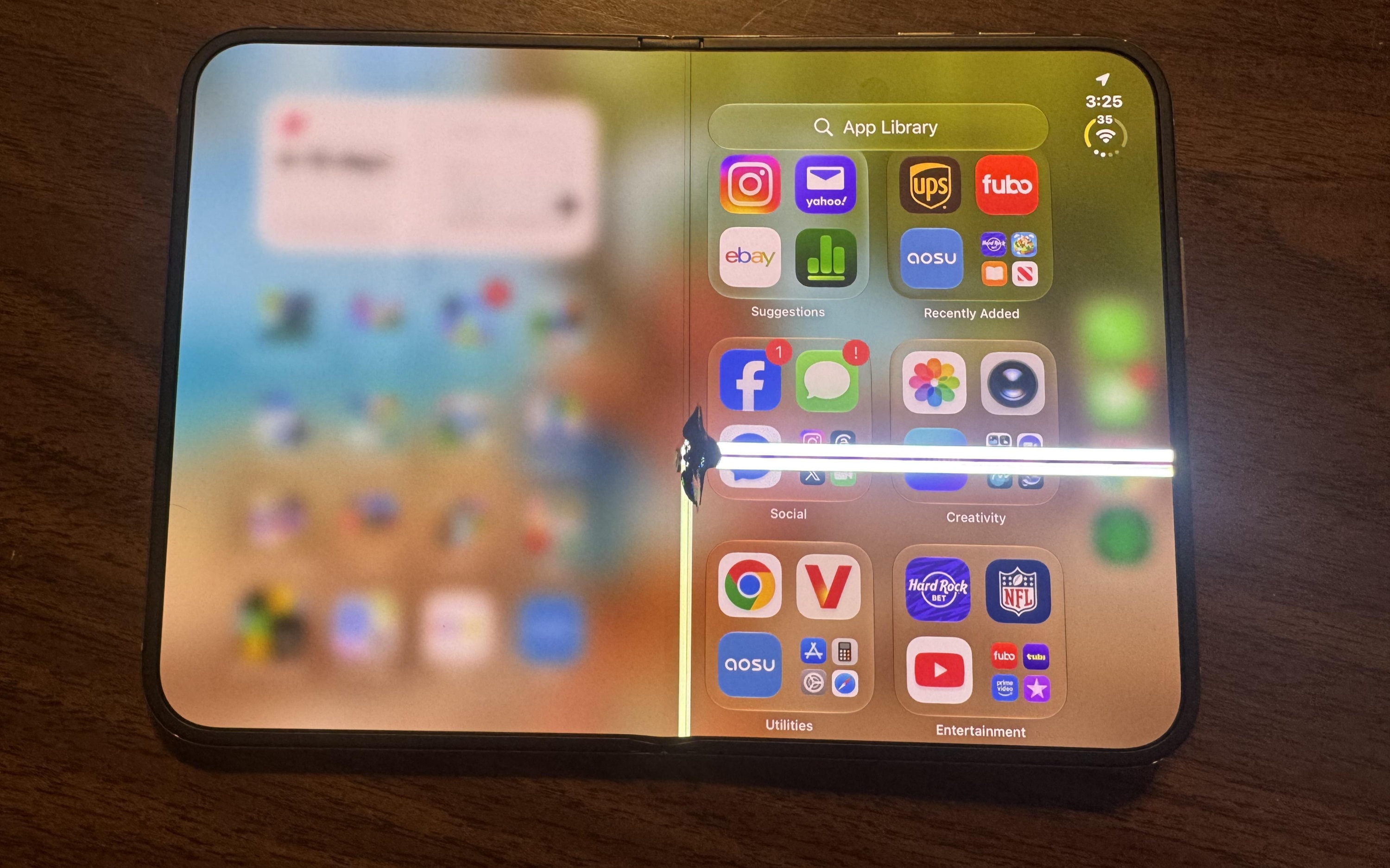 iPhone Duo smartphone showing screen damage
