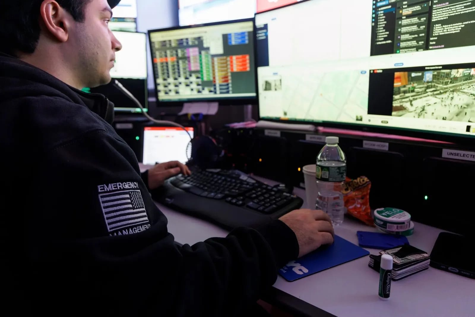 Image may contain Computer Computer Hardware Computer Keyboard Electronics Hardware Cup Adult Person and Monitor