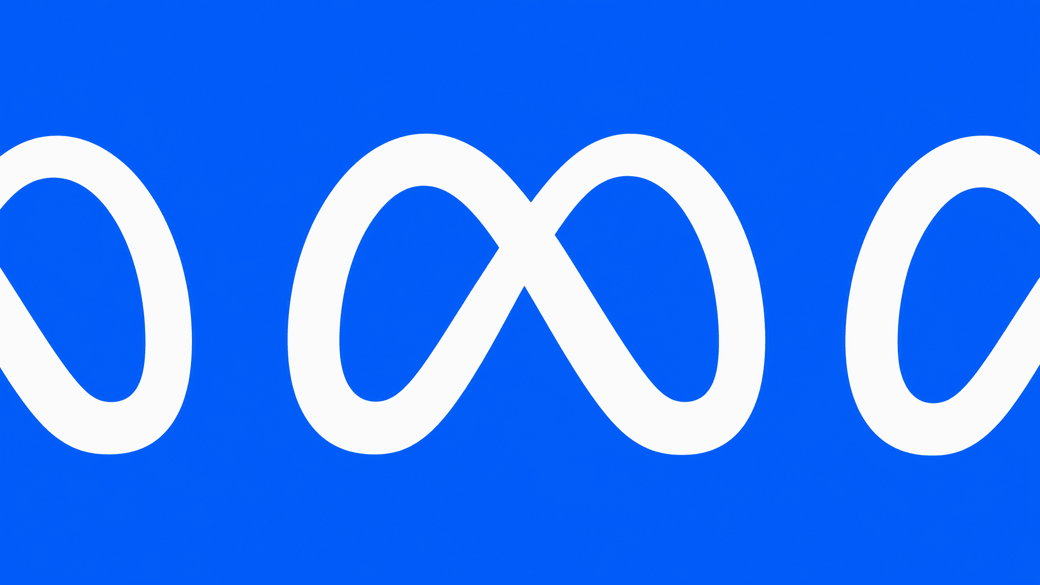 Meta logo displayed on a digital screen representing artificial intelligence development.