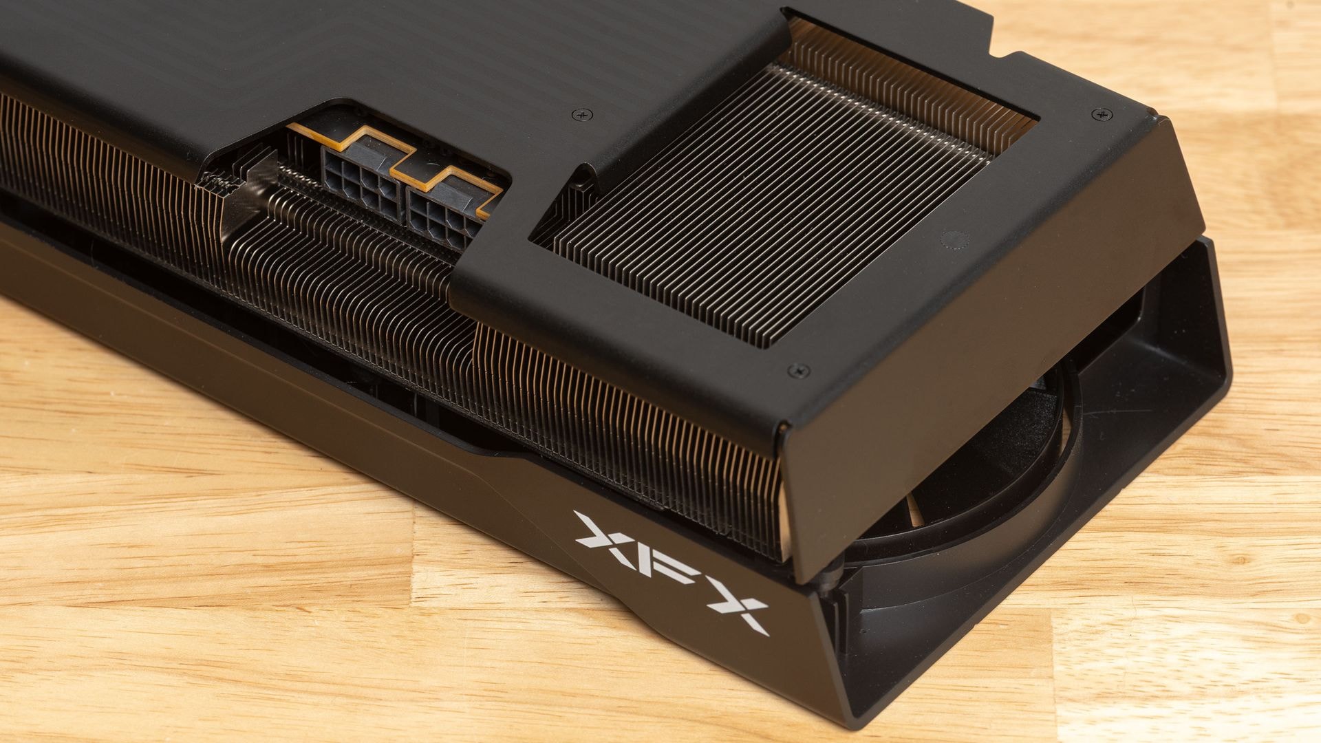 An AMD Radeon graphics card next to Nvidia DLSS branding