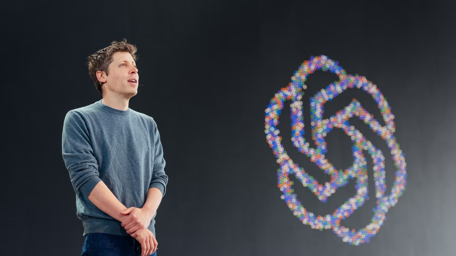OpenAI logo displayed on a digital screen