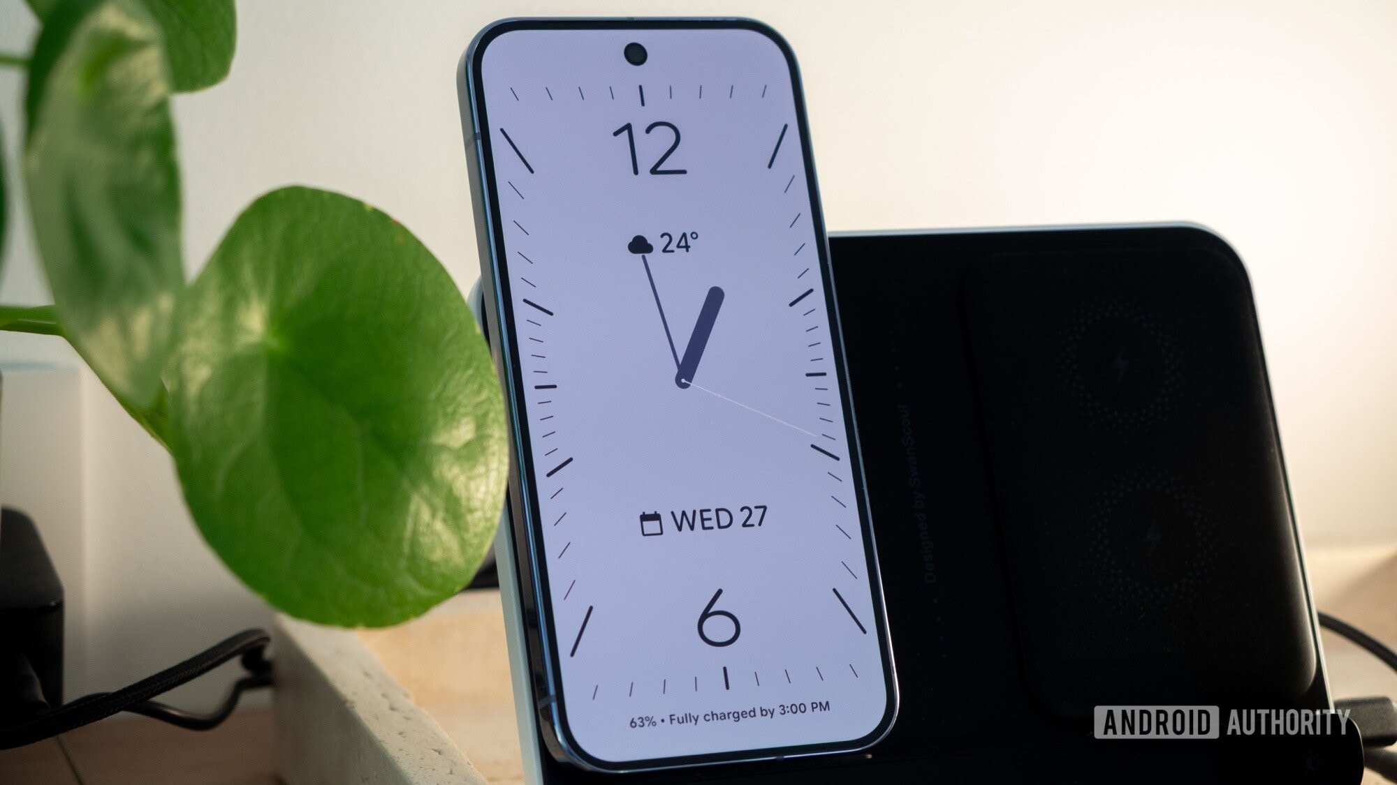 A Google Pixel smartphone displaying the clock application on its screen.