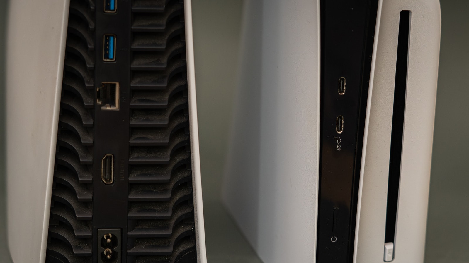 A PlayStation 5 console connected to a television via an HDMI cable.