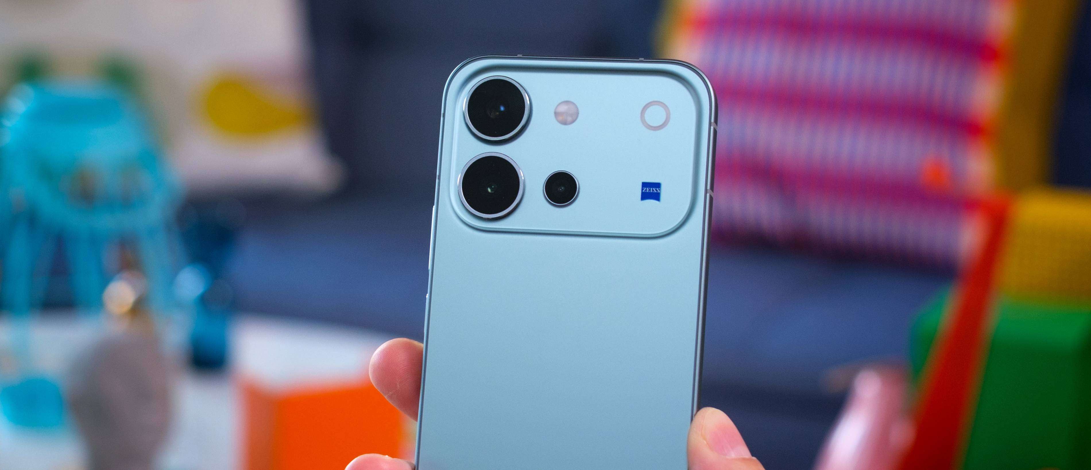 vivo V80 smartphone held in hand showing the rear camera module
