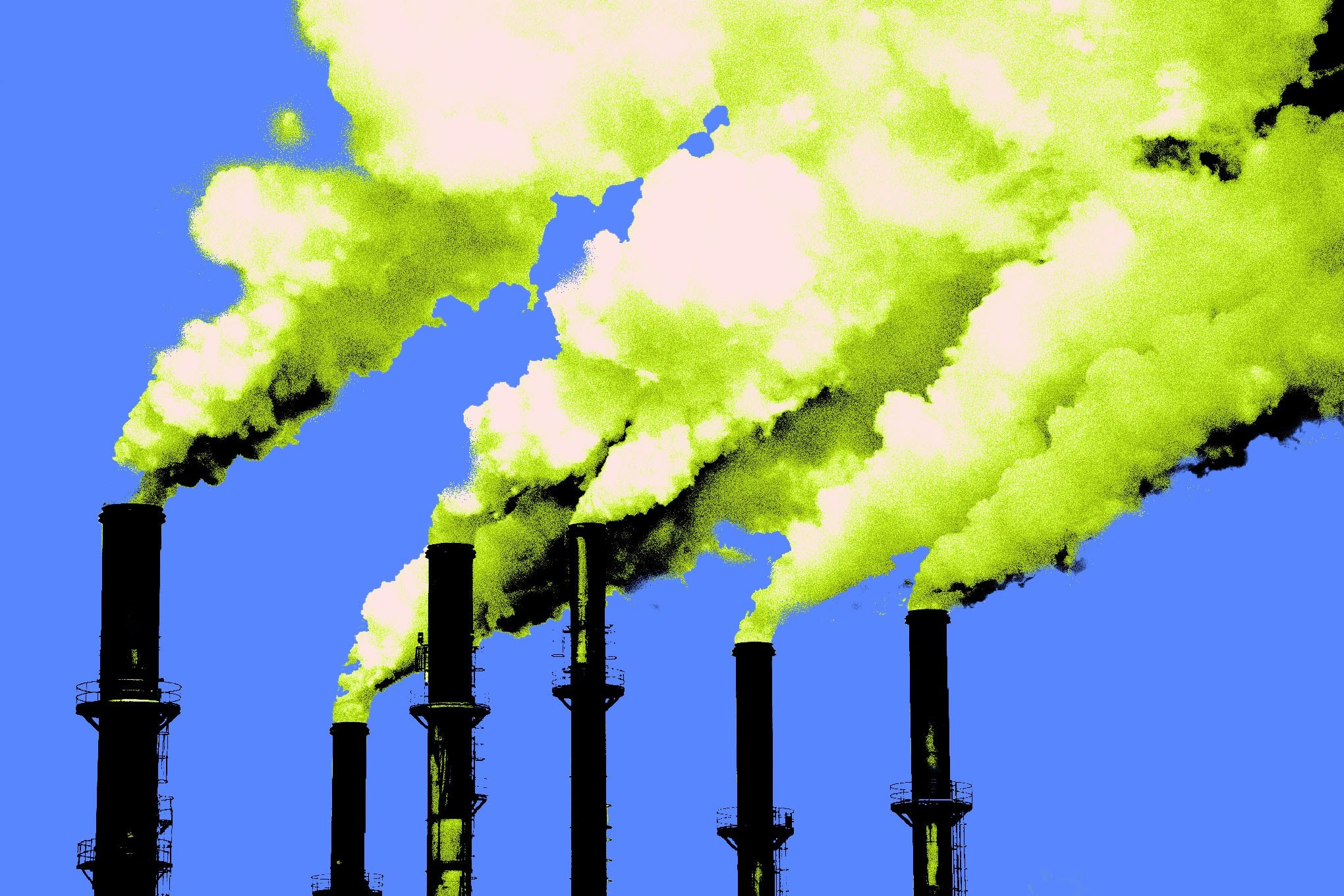 A large power plant emitting steam into the sky.